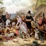 A painting of the first Thanksgiving featuring pilgrims and native Americans.